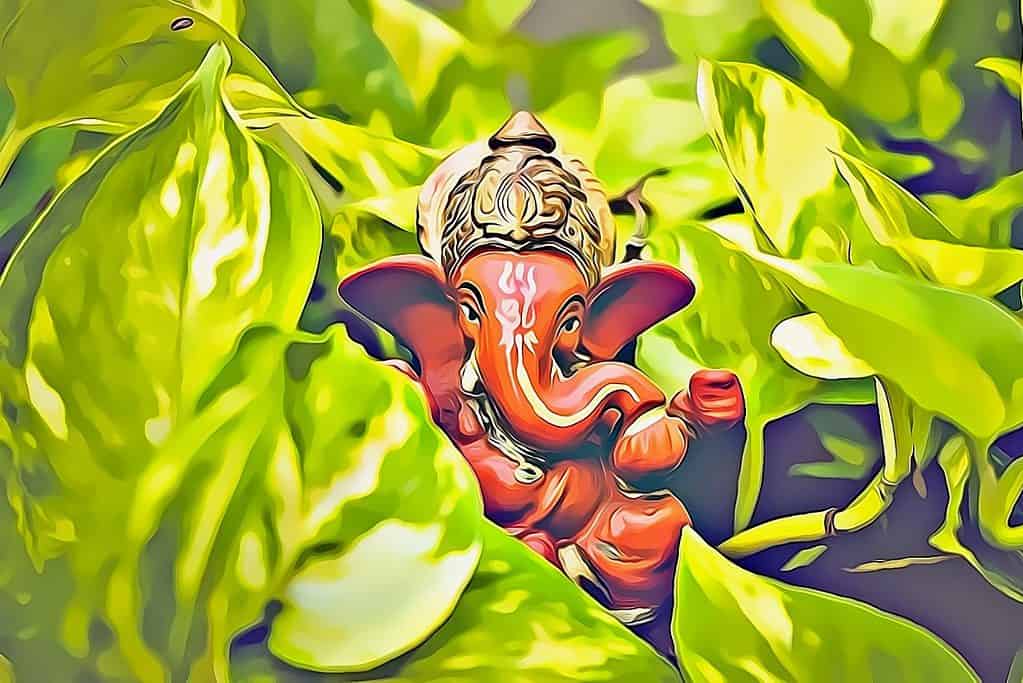 Red ganesha figurine idol