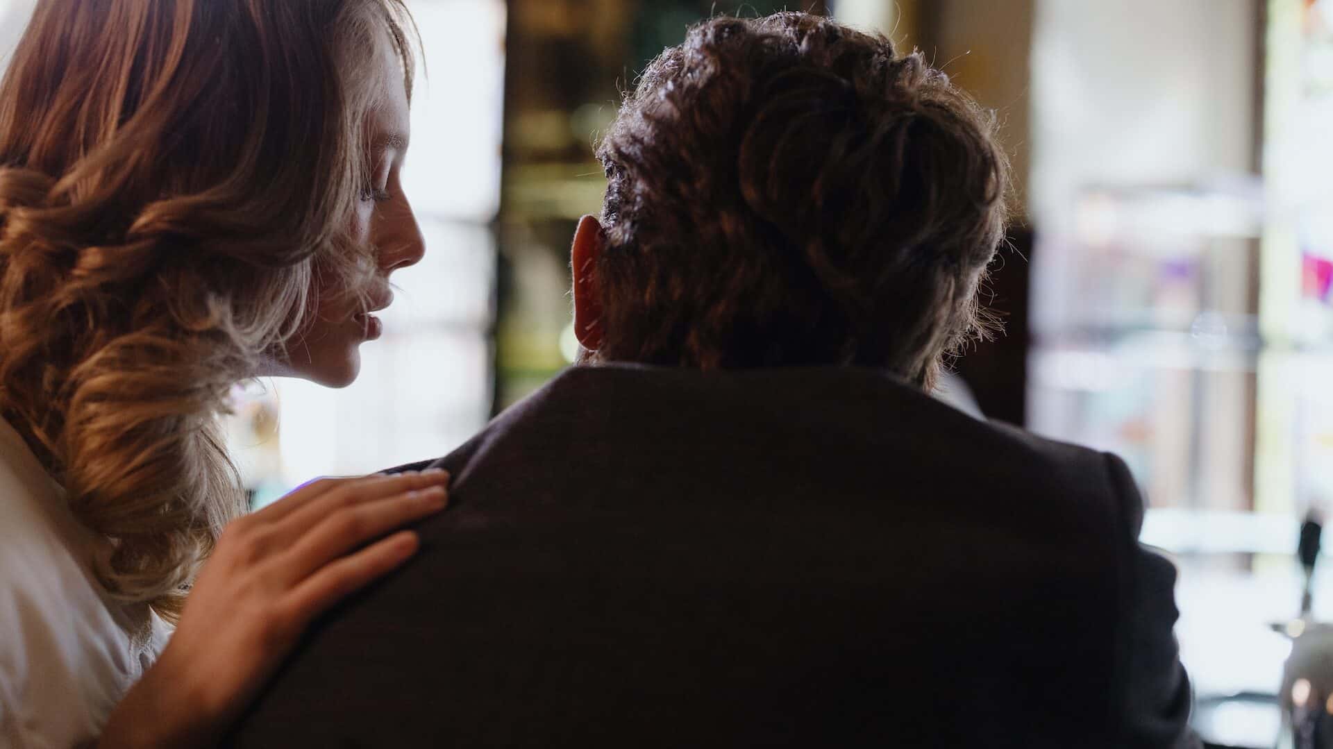 Woman Whispering in Man's Ear. Lazy Whisperer & Lazy Christians